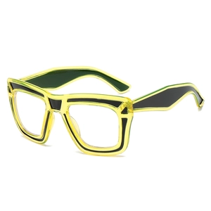 Fashionable oversized yellow transparent glasses frame with bold black color blocking accents