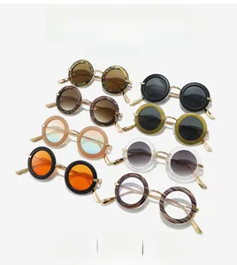 Detailed collection of vintage oval sunglasses with metallic temples in eight assorted colors