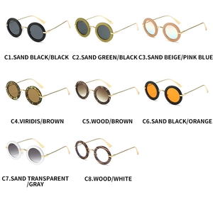 Collection of oval retro sunglasses in various frame colors with slim golden metal temples