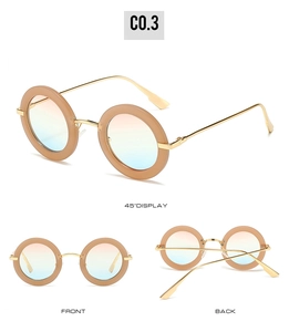 Three-dimensional view of oval vintage sunglasses with pink frames and gradient lenses