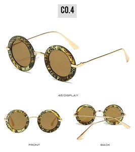 Multi-angle views of vintage oval leopard print sunglasses with golden metal temples