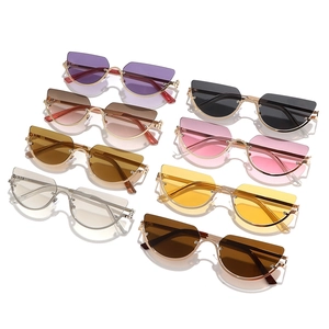 Eight pairs of chic semi-rimless geometric sunglasses with gold metal frames and varied lenses