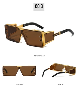 Détails de lunettes de soleil steampunk oversize avec monture dorée et protections latérales