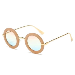 Vintage oval sunglasses with beige frames, gold metal temples, and gradient lenses