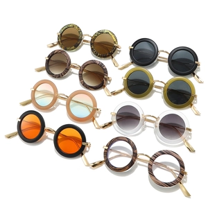 Vintage oval sunglasses set in eight diverse colors with gold metal temples for women