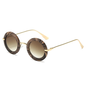 Retro oval sunglasses with wood grain frame and gold metal temples in 45-degree view