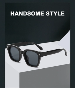 Detail view of retro oversized black square sunglasses with silver diamond metal accents