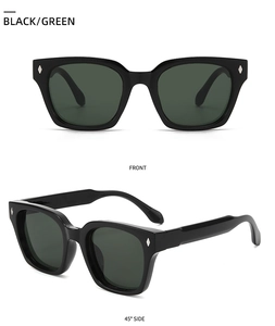Retro black frame sunglasses with dark green lenses and silver diamond metal studs