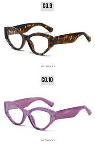 45-degree angle view of vintage cat-eye sunglasses in tortoiseshell and translucent purple