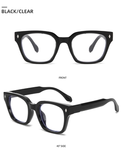Macro detail of black square glasses frame showing silver diamond rivets and clear lenses