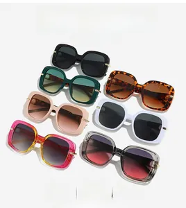 Detailed grid of square fashion sunglasses in multiple colors with gold metal accents