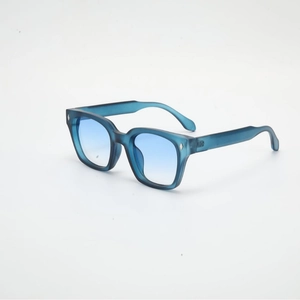 Retro oversized square sunglasses with blue translucent frames and gradient lenses
