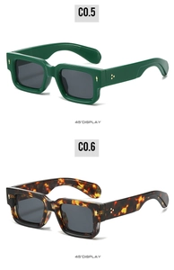Detailed 45-degree angle view of green and tortoise square frame sunglasses with rivets