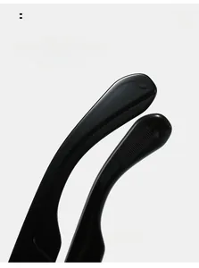 Close-up of black curved sunglasses legs with fine non-slip texture for comfort