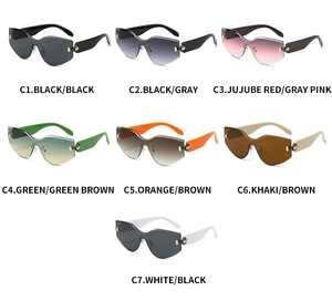 Detailed grid of frameless shield sunglasses in seven assorted color options with hex joints