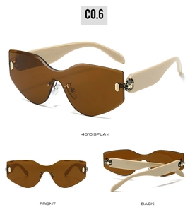 Detail of rimless sunglasses with beige temples and gold snake head metal ornament