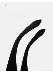 Detail of ergonomic curved black temple tips on rimless sunglasses for comfortable wear