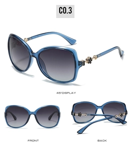 Detailed views of women's oversized blue sunglasses with floral metal accents on the temples