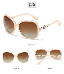 Three-view display of women's polarized oversized sunglasses with clover temple detail