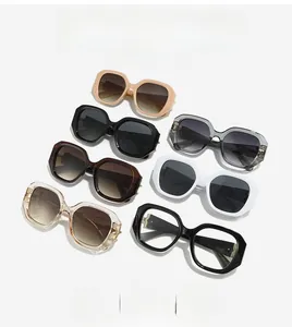 Group of retro square sunglasses in various colors including beige, black and gray