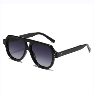 Classic aviator sunglasses with black thick frames and gray gradient lenses in a 45-degree view