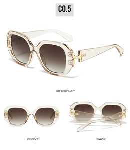Detail view of champagne square sunglasses with gradient brown lenses and metal accents