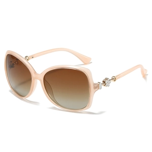 Women's oversized clover polarized sunglasses with pink frames and gradient lenses