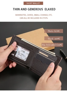 Detail of bifold brown leather wallet showing 3 card slots and a clear ID window