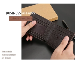Detail of a brown leather bifold wallet with card slots and a clear ID window
