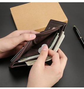 Brown leather men's trifold wallet with multiple card slots and zippered coin compartment