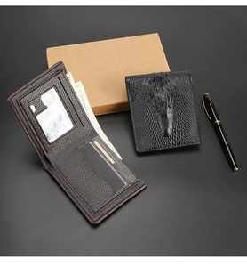 Close-up of crocodile embossed leather wallet with card slots and bill compartment