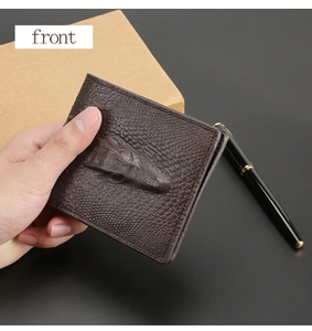 Front view of men's leather wallet featuring textured crocodile head relief and bifold design