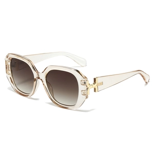 Square champagne frame sunglasses with brown gradient lenses and golden metal accents