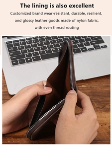Macro detail of dark brown wallet showing smooth zipper and durable nylon inner lining