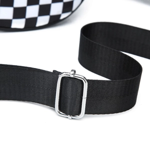 Detail view of the durable nylon shoulder strap and adjustable silver metal buckle on bag