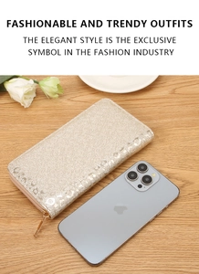 Close-up of champagne gold wallet with sequin leopard print and golden zipper detail