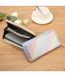 Macro view of long zipper wallet interior slots and leopard pattern embossed surface