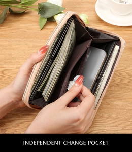 Detail view of pink long wallet with multiple card slots and independent change pocket
