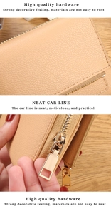 Detailed macro of beige lychee texture leather wallet with gold metal zipper pull