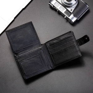 Detailed view of the men's black PU leather wallet with multiple card slots and secure clasp