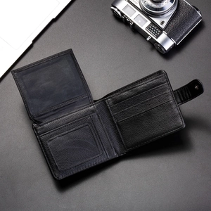 Men's black lychee leather bifold wallet with snap button and multiple card slots
