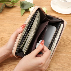 Rose gold sequined long wallet with large capacity and multi-card slots shown open