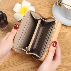 Short beige zip wallet for women featuring multi-slot card holders and premium lychee texture