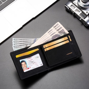 Detailed interior of minimalist bifold wallet with card slots and multiple currency compartments