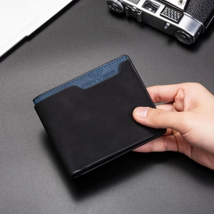 Close-up of a matte black leather wallet for men featuring blue leather trim and embossed logo