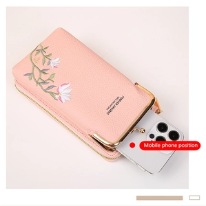 Detail of pink lychee grain mobile phone bag with floral embroidery and metal clasp