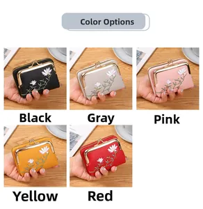 Detail view of mini PU leather wallets featuring white lotus embroidery in five colors