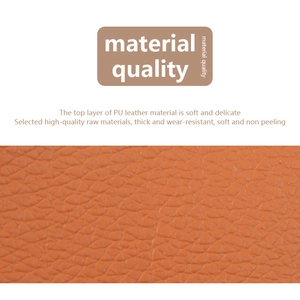 Detail of orange litchi grain PU leather showing soft, wear-resistant texture