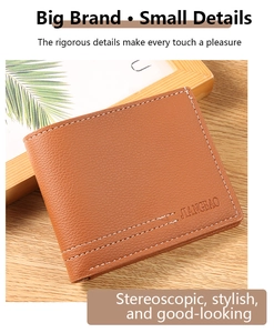 Detail of brown litchi pattern leather wallet with white stitching and embossed logo