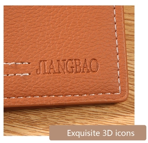 Detailed view of brown litchi grain leather wallet with white stitching and embossed logo